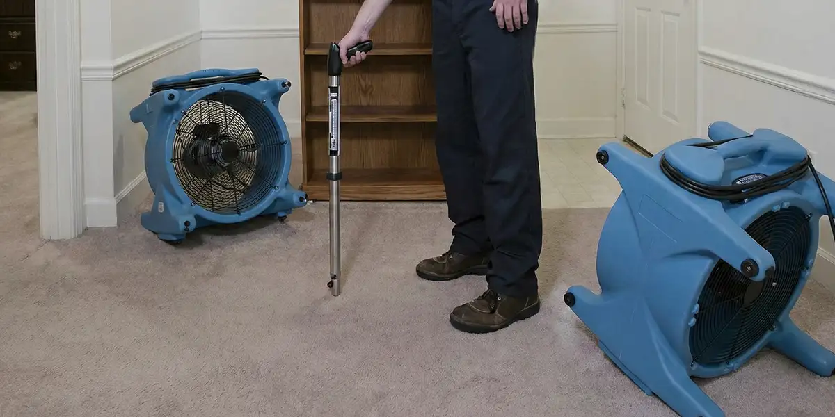 emergency water removal equipment deployed to dry a flooded residential interior in Colorado Springs, CO