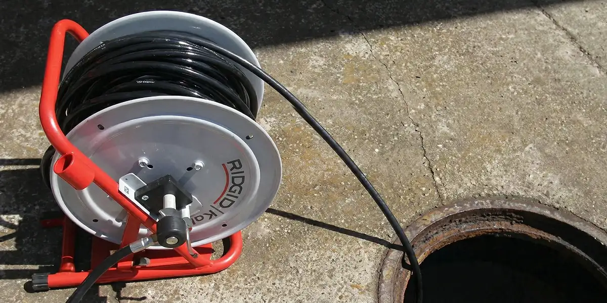 sewer rodding equipment prepared to clear clogged sewer lines in Colorado Springs, CO